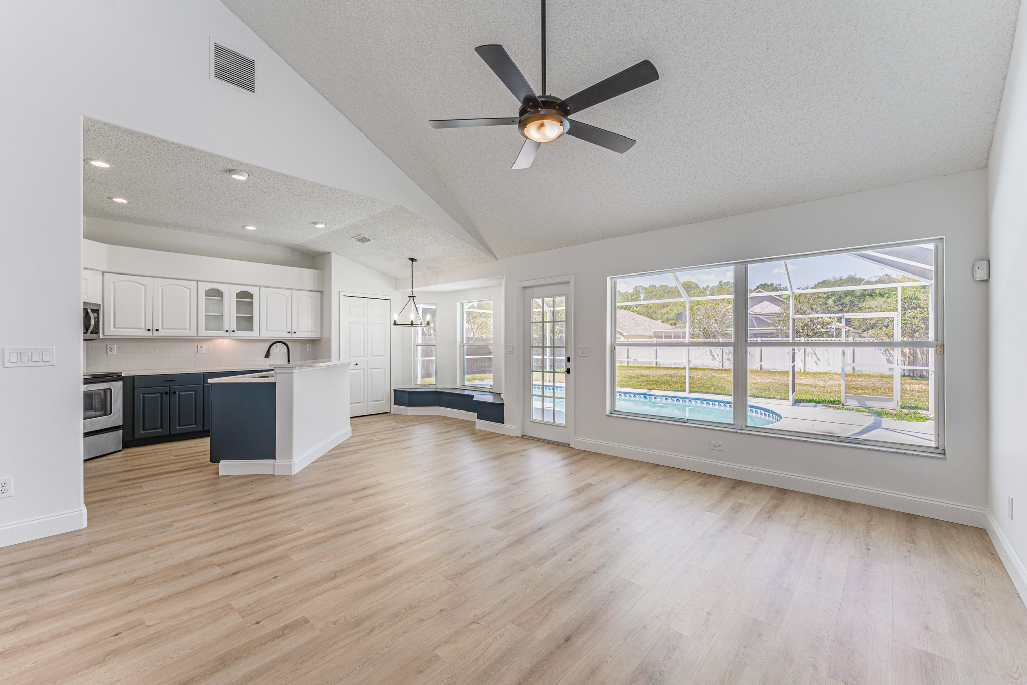 Tampa Bay whole home remodeling — open-plan kitchen and living room
