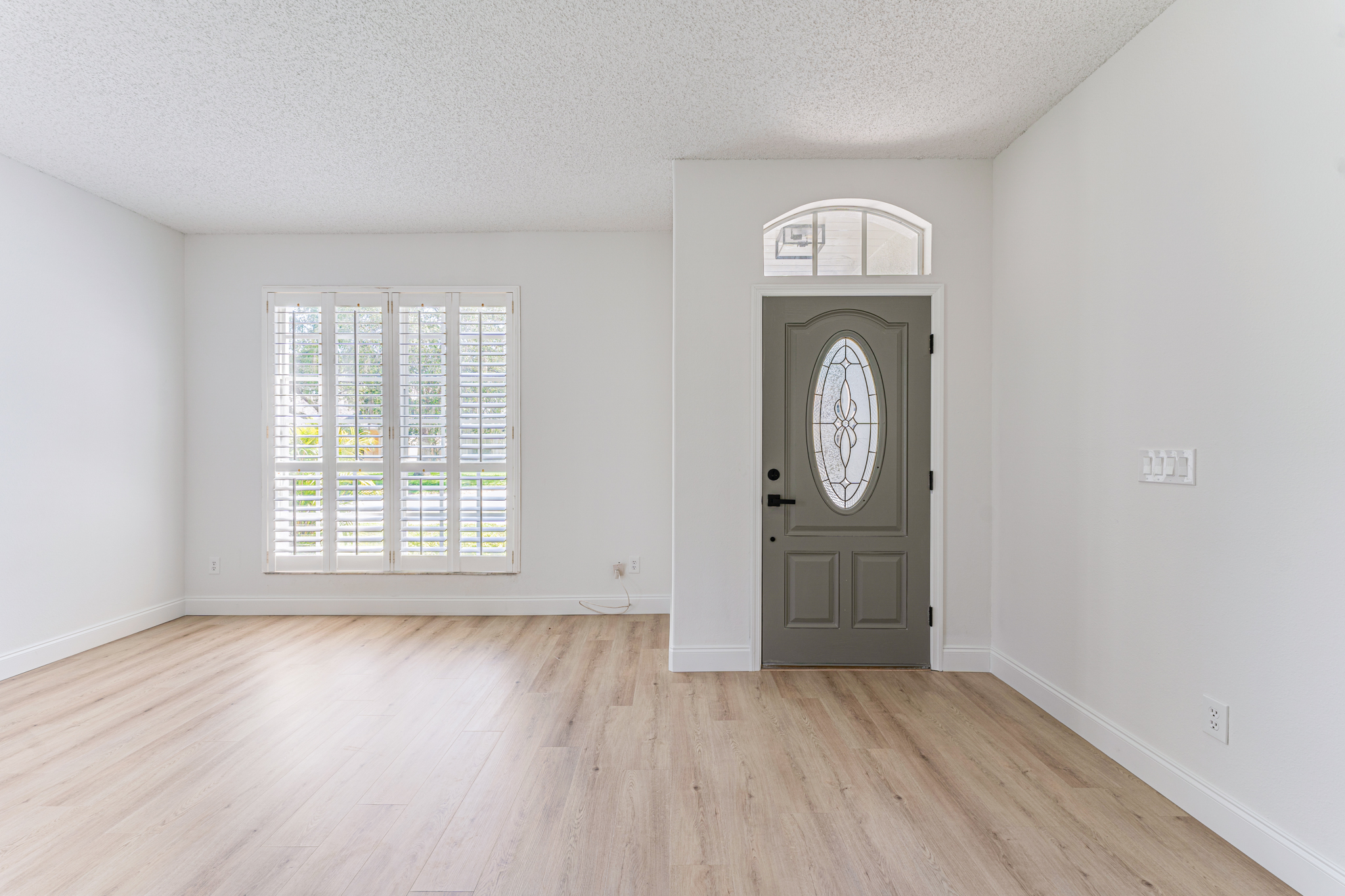 Tampa Bay whole home remodeling — open-plan whole home kitchen and living room remodel