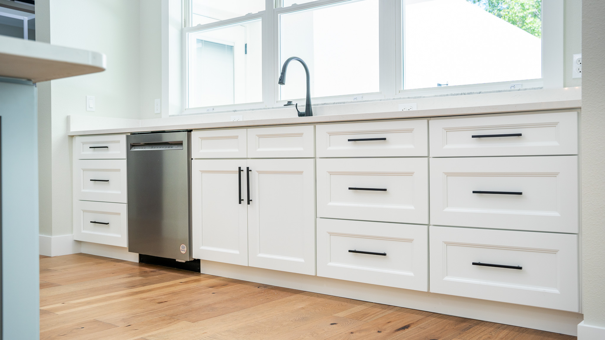 Tampa Bay kitchen remodeling — custom white and natural shaker kitchen remodel