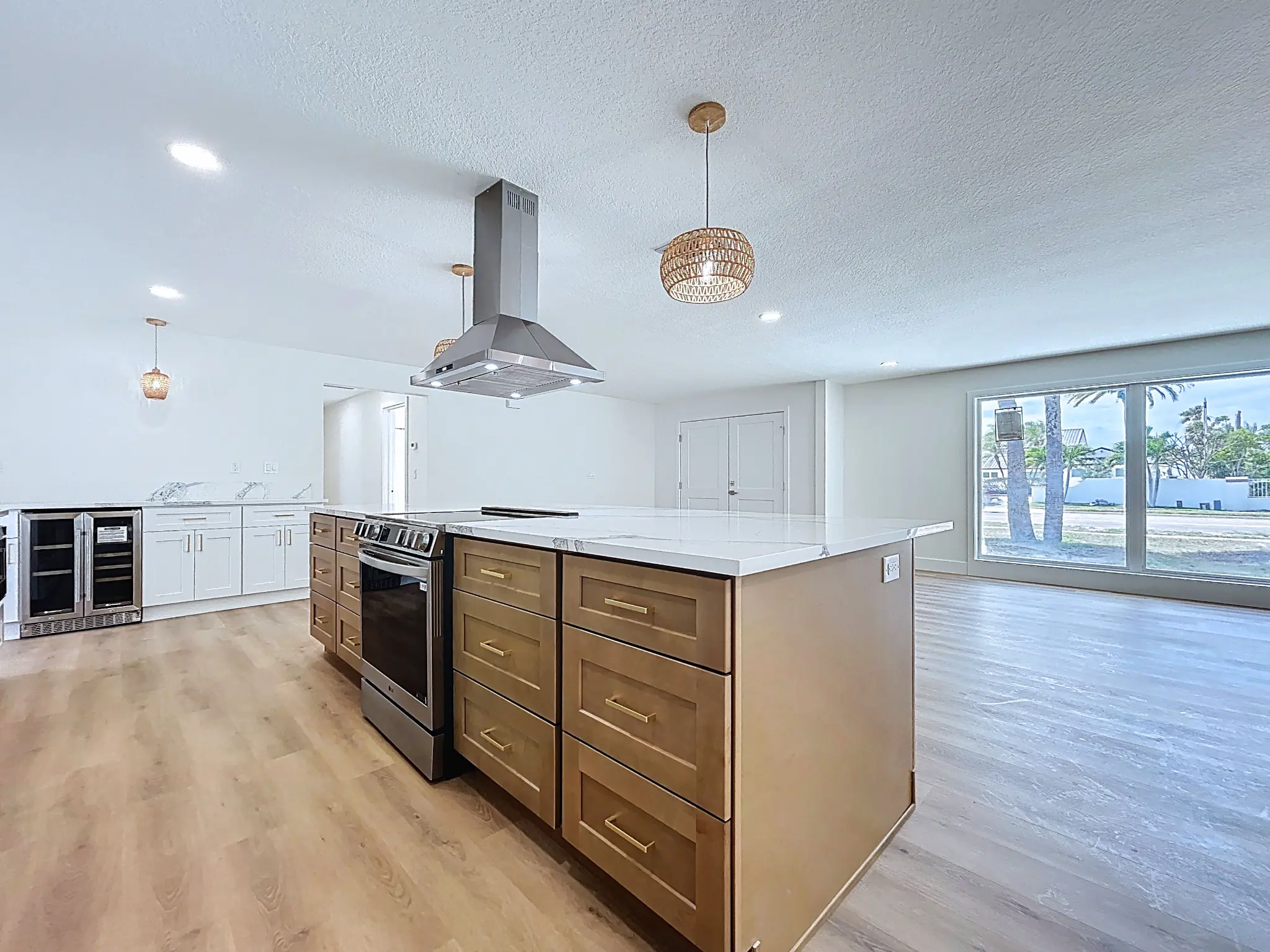 Tampa Bay kitchen remodeling — white and natural shaker kitchen with brass details