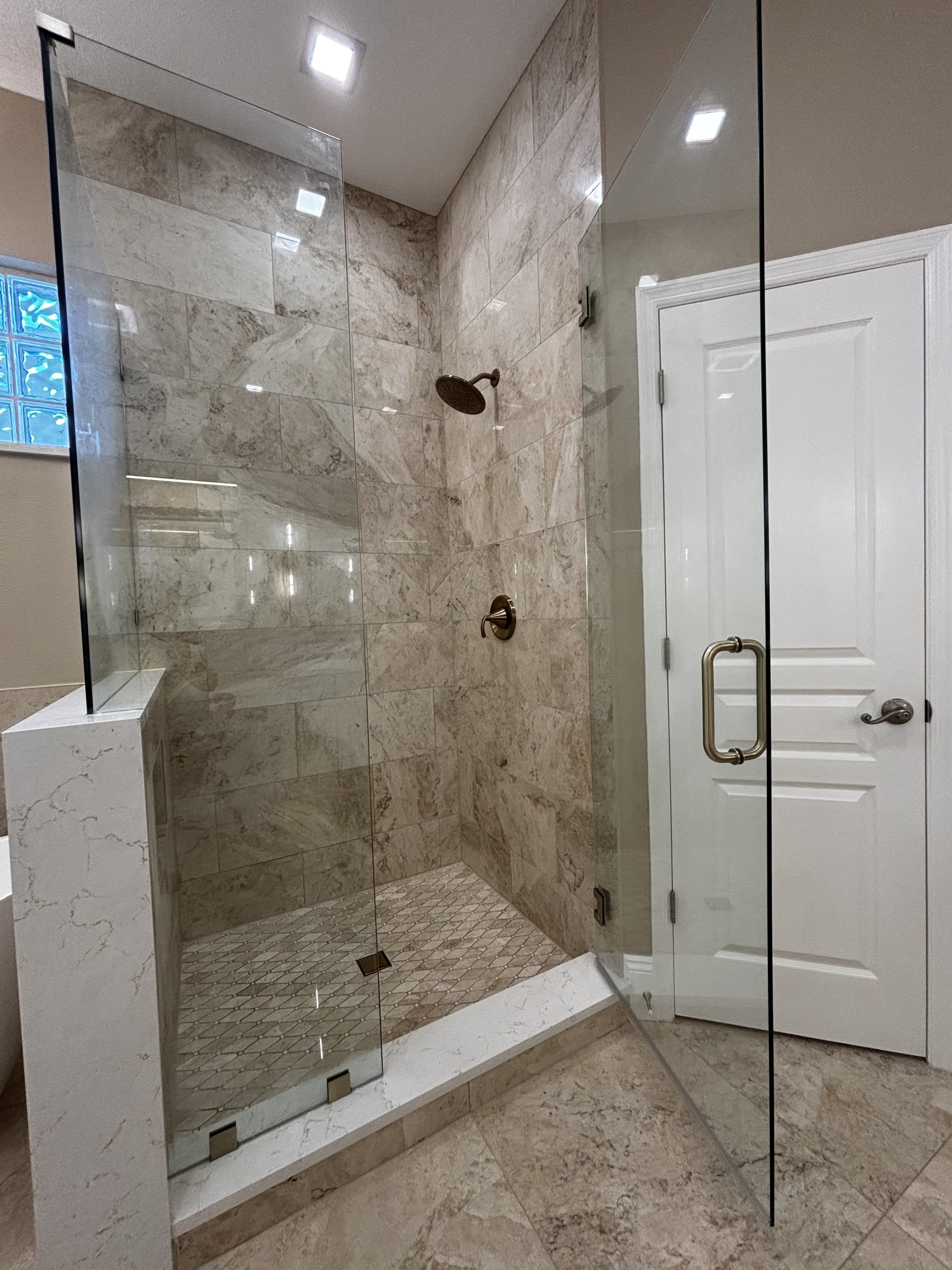 Tampa Bay bathroom remodeling — marble shower bathroom renovation