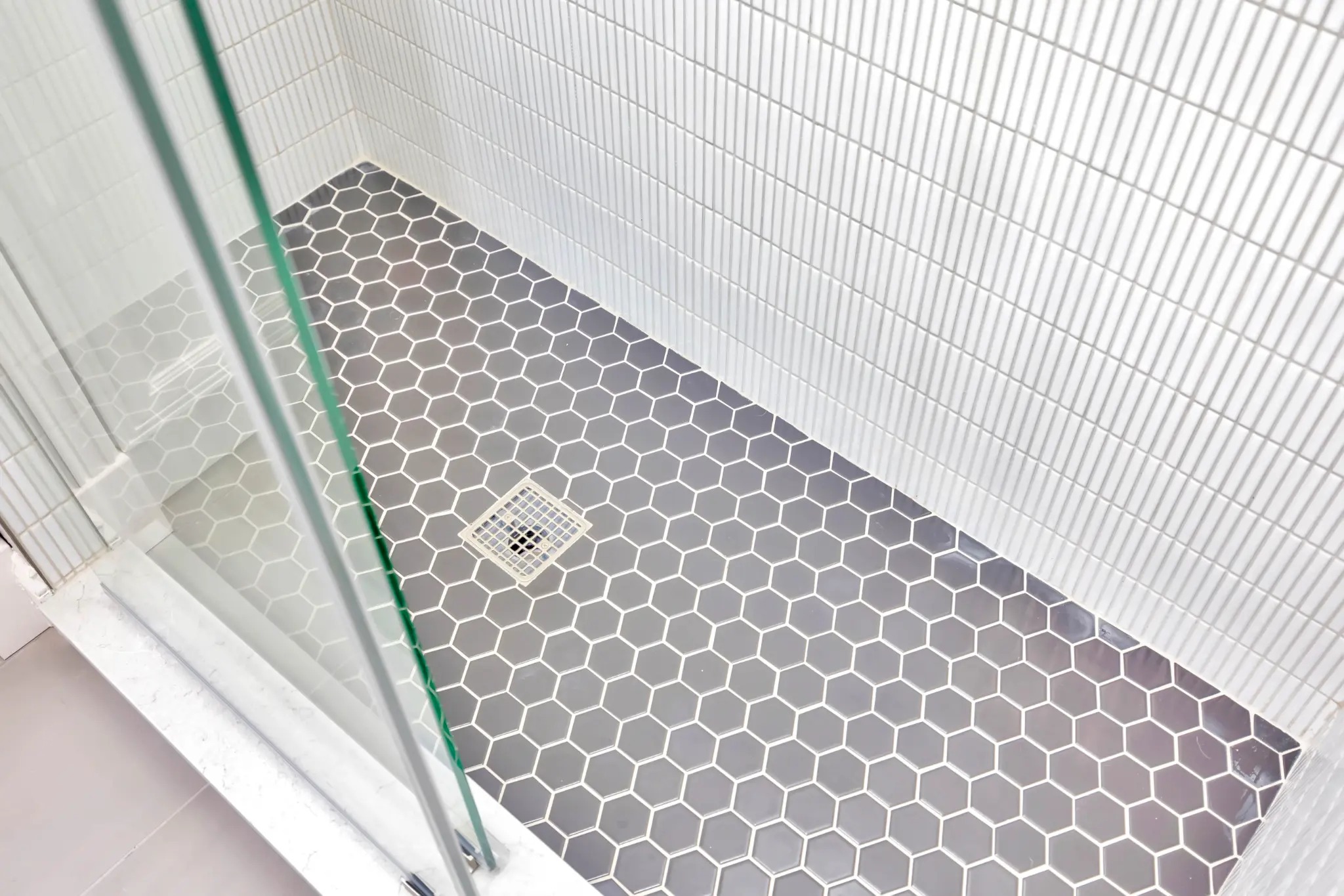 Tampa Bay bathroom remodeling — white subway tile shower detail