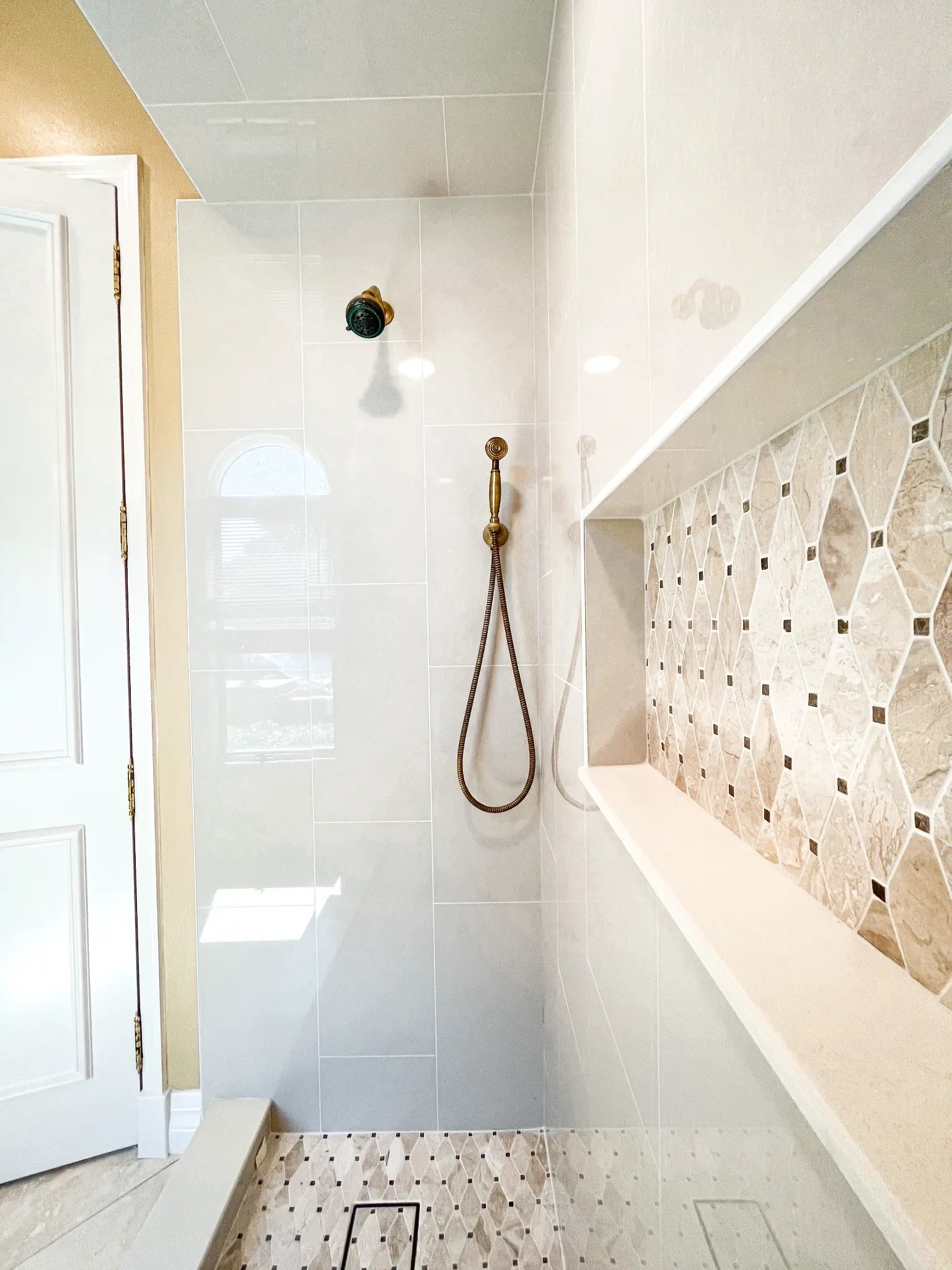 Tampa Bay bathroom remodeling — custom white tile shower detail