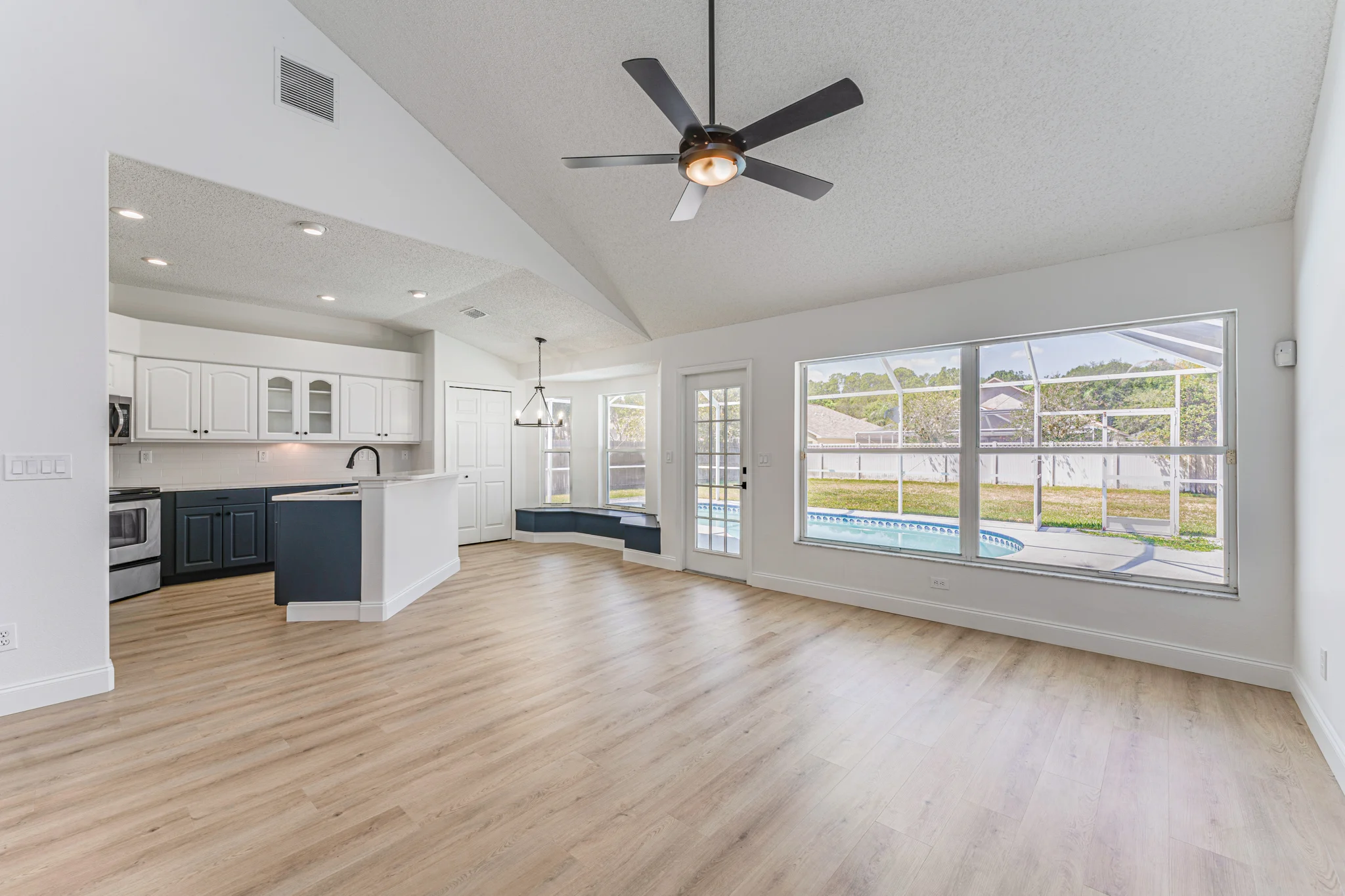 Tampa Bay whole home remodeling — open-plan kitchen and living room
