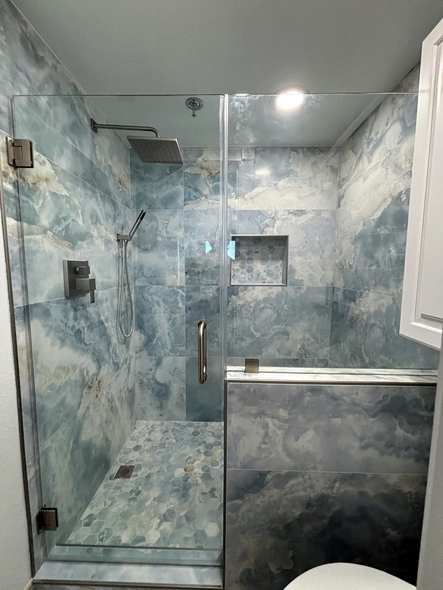 Bathroom remodeling in Tampa Bay — Blue hex tile shower detail