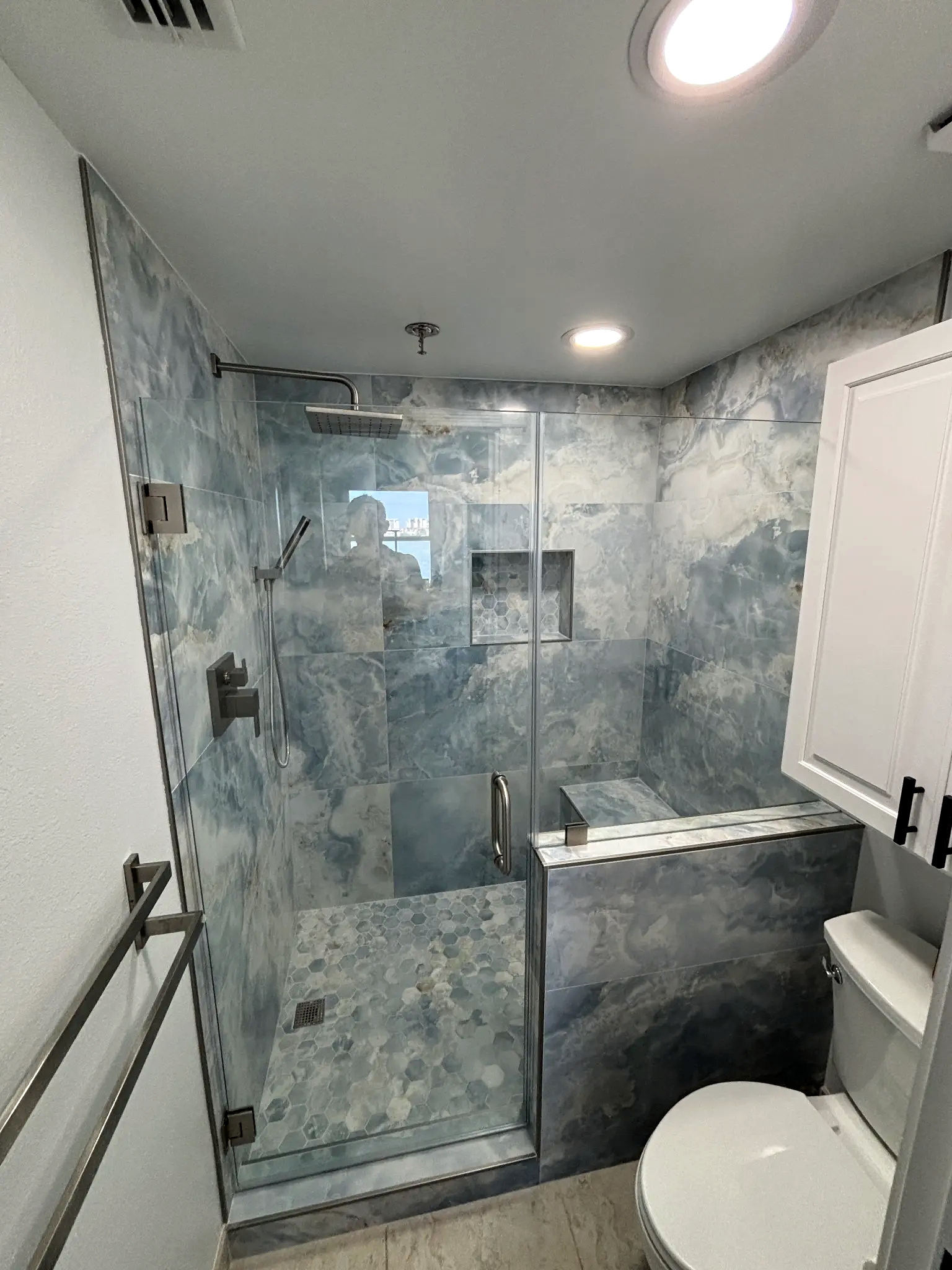 Bathroom remodeling in Tampa Bay — Blue hex tile shower shelf