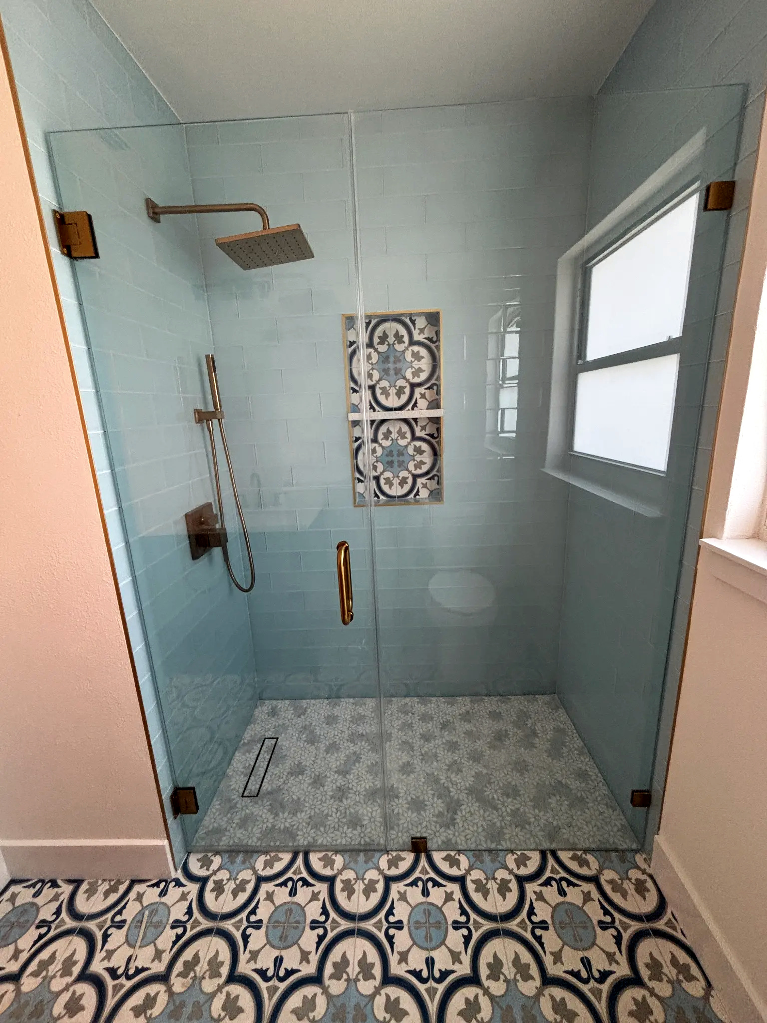 Bathroom remodeling in Tampa Bay — Blue subway tile bathroom shower