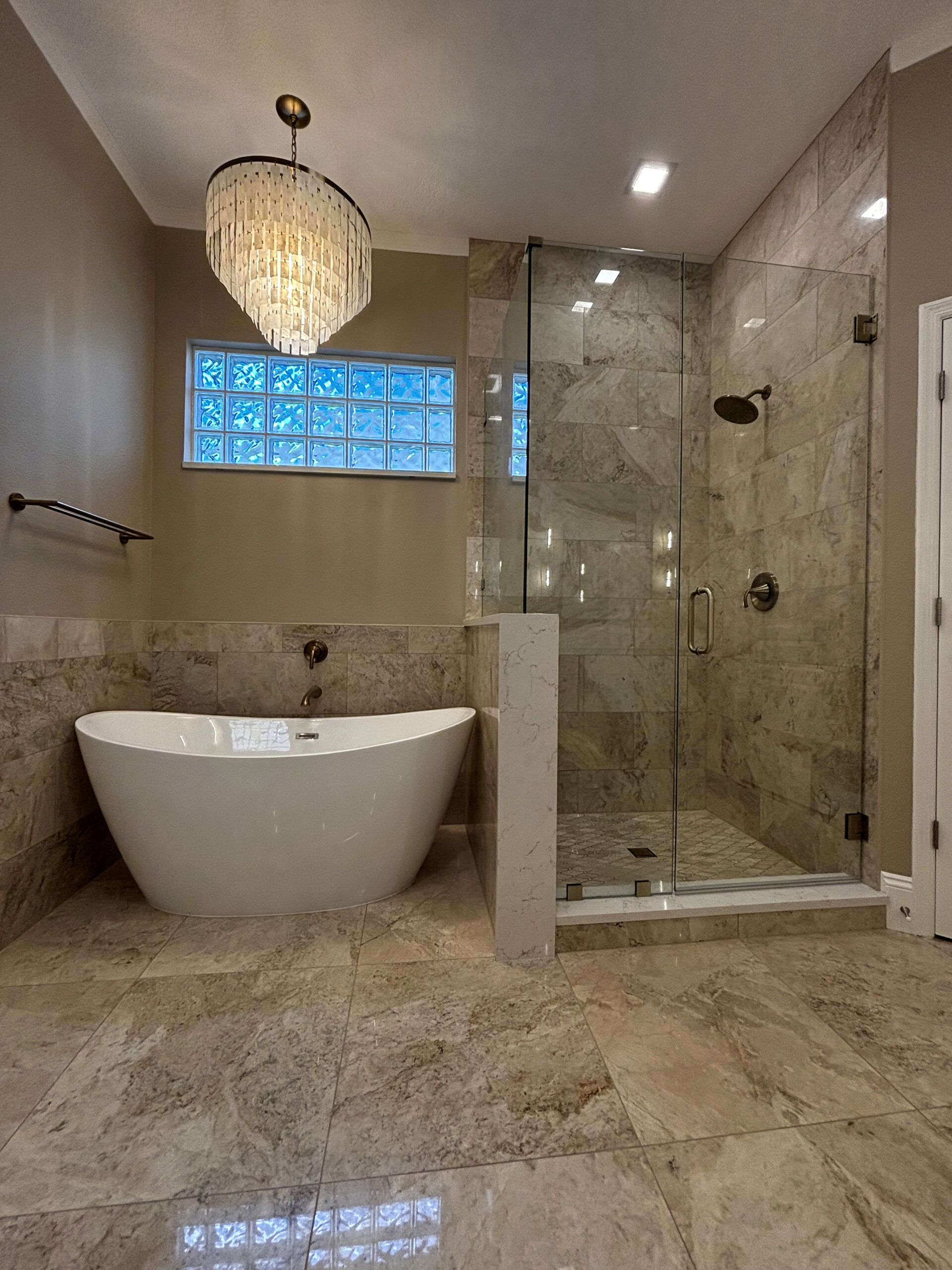 Bathroom remodeling in Tampa Bay — Freestanding tub in a tile bathroom