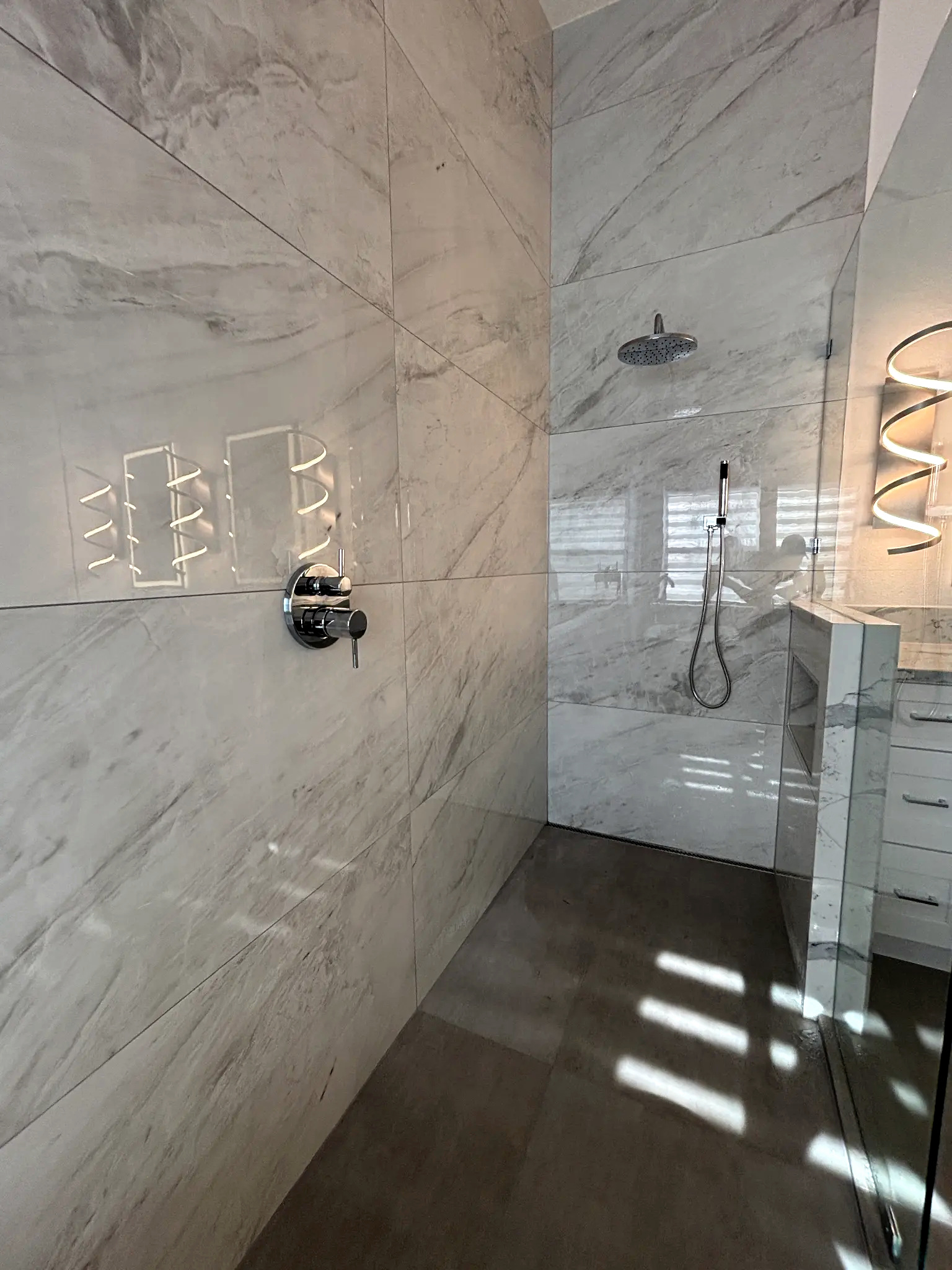 Bathroom remodeling in Tampa Bay — Large-format tile bathroom detail