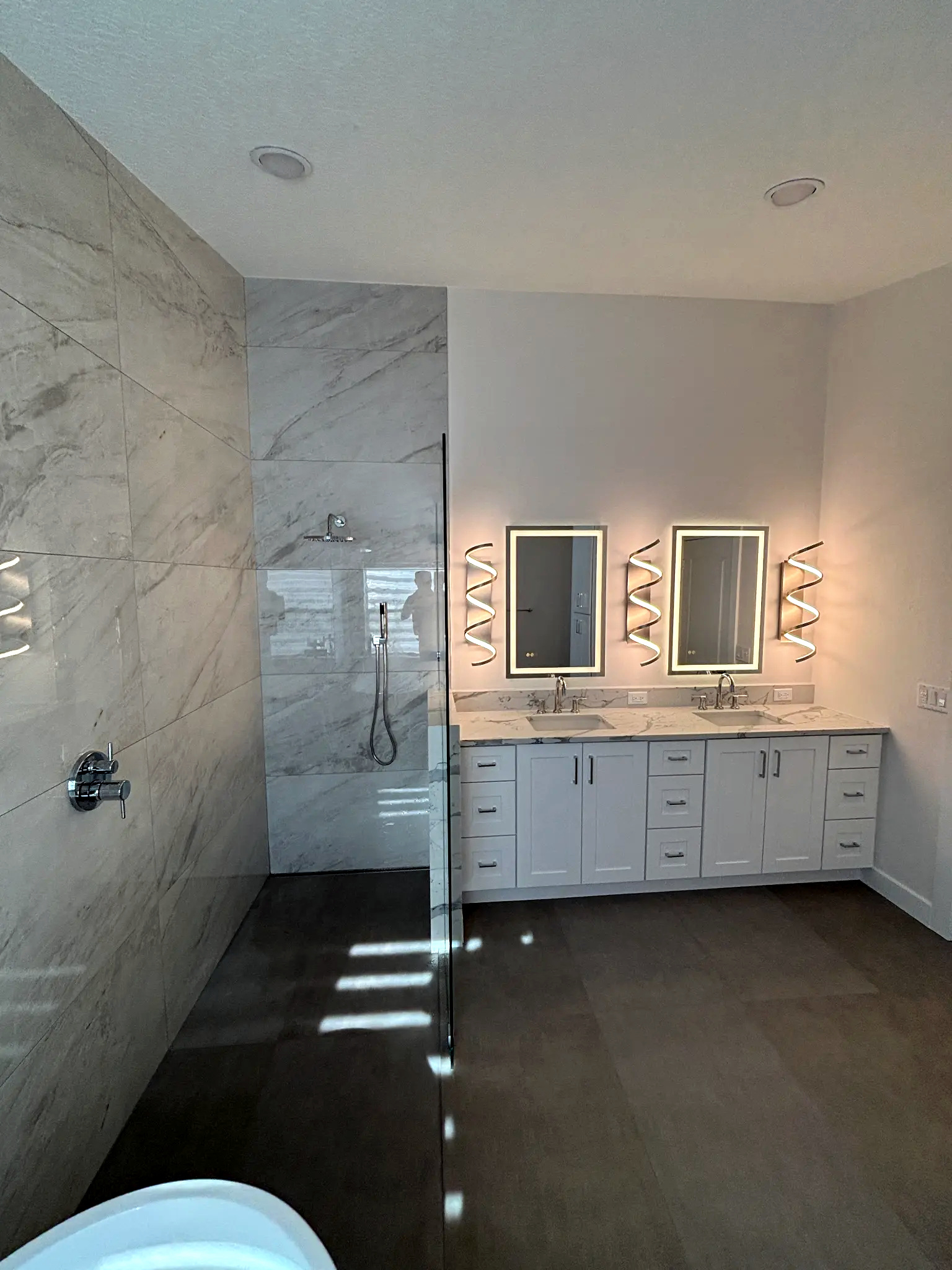 Bathroom remodeling in Tampa Bay — Grey wet room shower and vanity