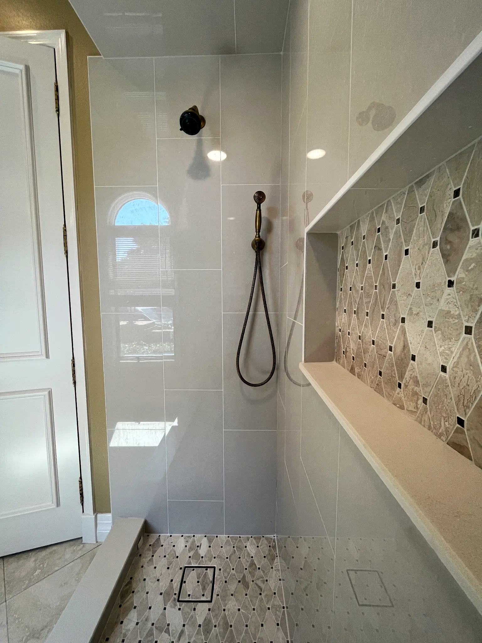 Bathroom remodeling in Tampa Bay — Large-format tile walk-in shower