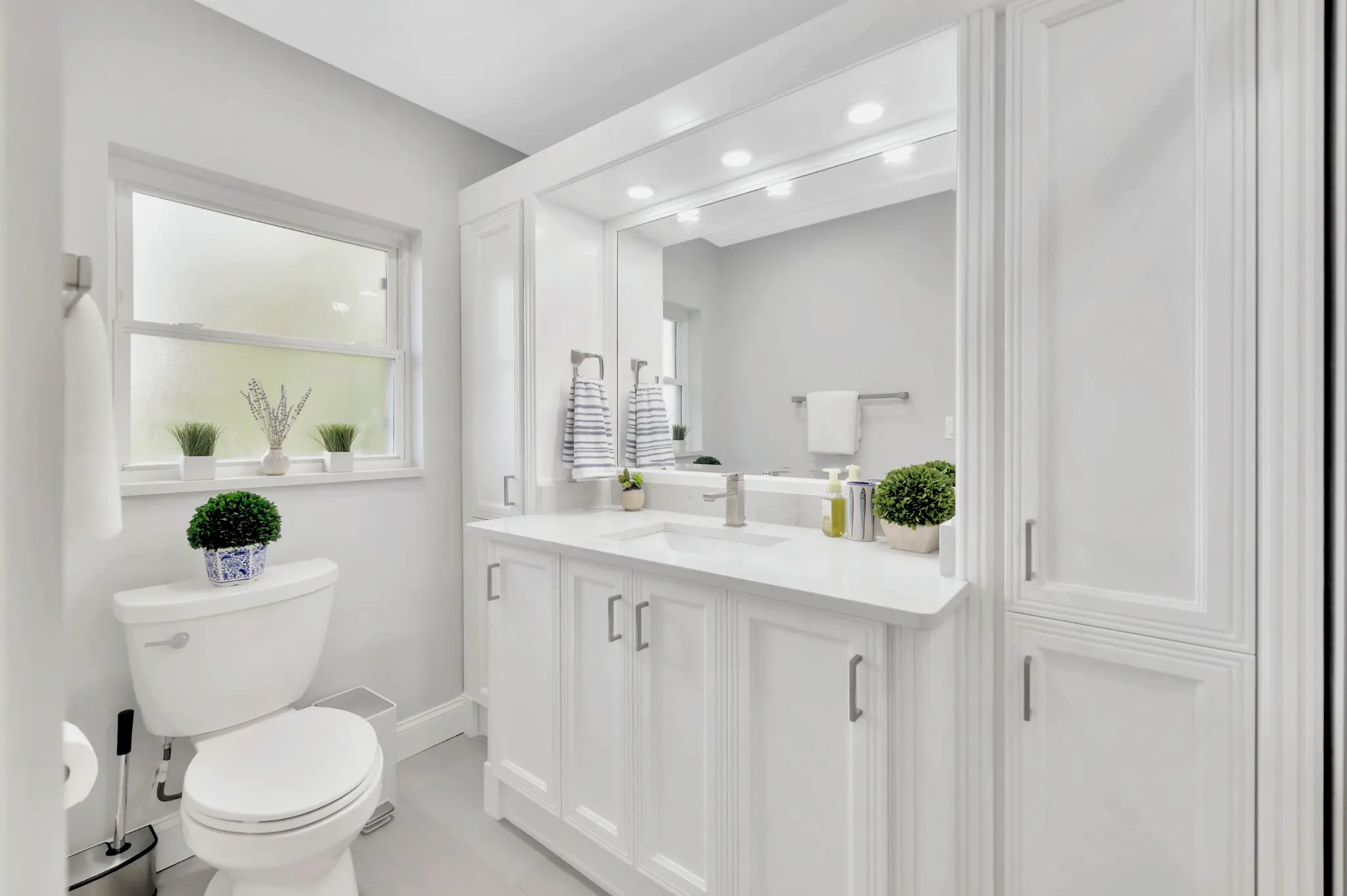 Bathroom remodeling in Tampa Bay — White raised panel bathroom vanity