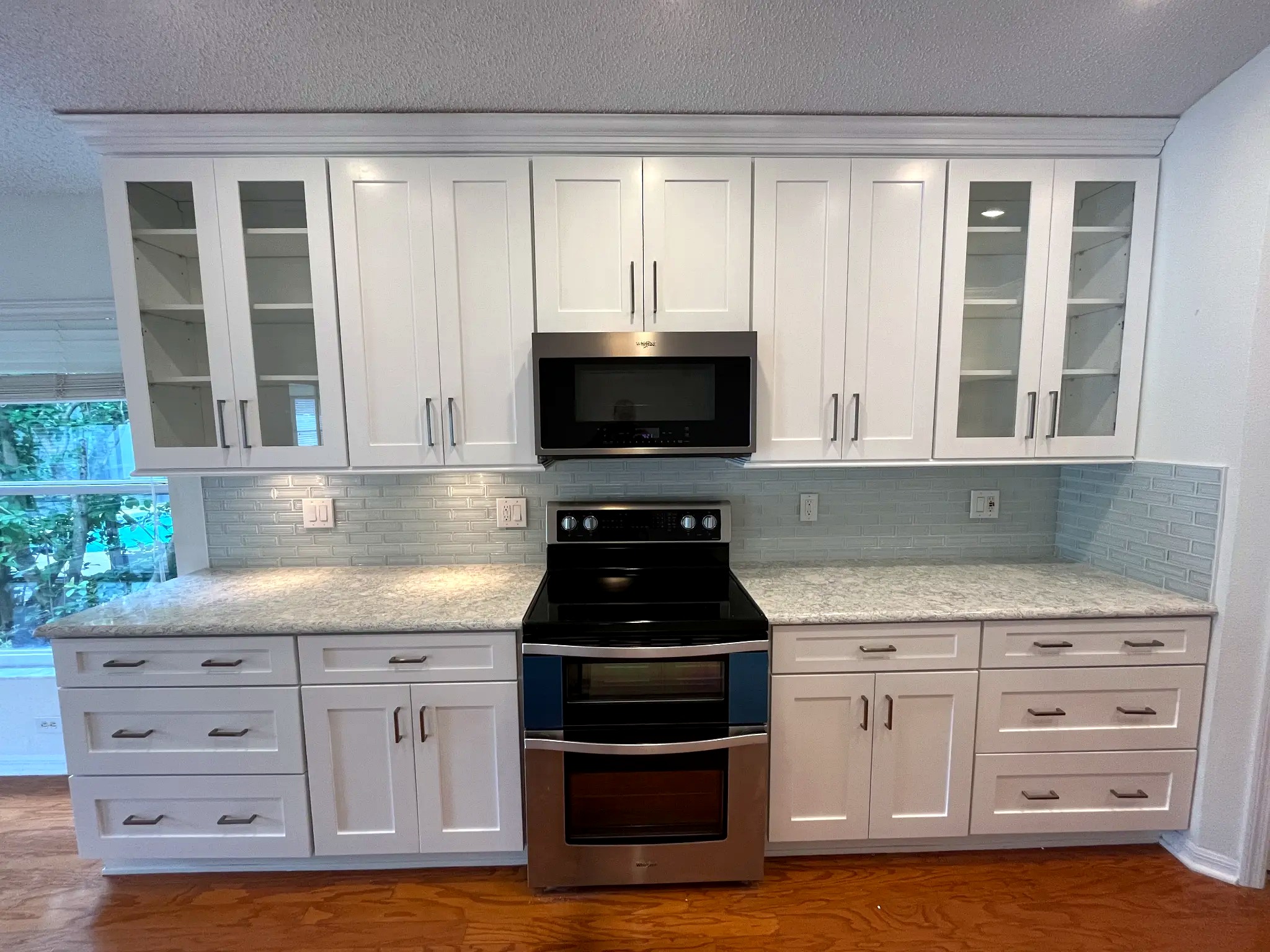 White cabinet refinishing kitchen with glass upper doors